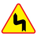 Znak drogowy ostrzegawczy A-4 ostrzega o występowaniu serii niebezpiecznych zakrętów 1050 mm